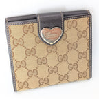 Gucci GG Canvas Compact Wallet mit Herz-Plakette